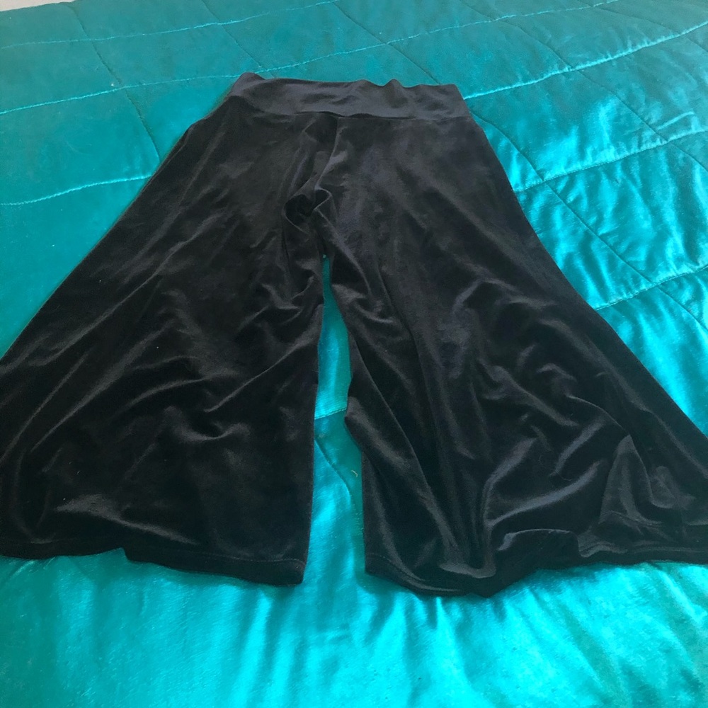 POOF!  Black velvet capri length pants.